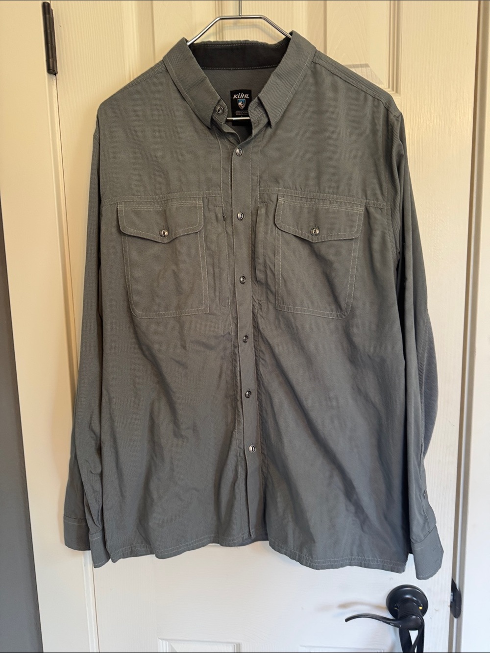 Men’s size Large KUHL brand long sleeve sportsman shirt.
